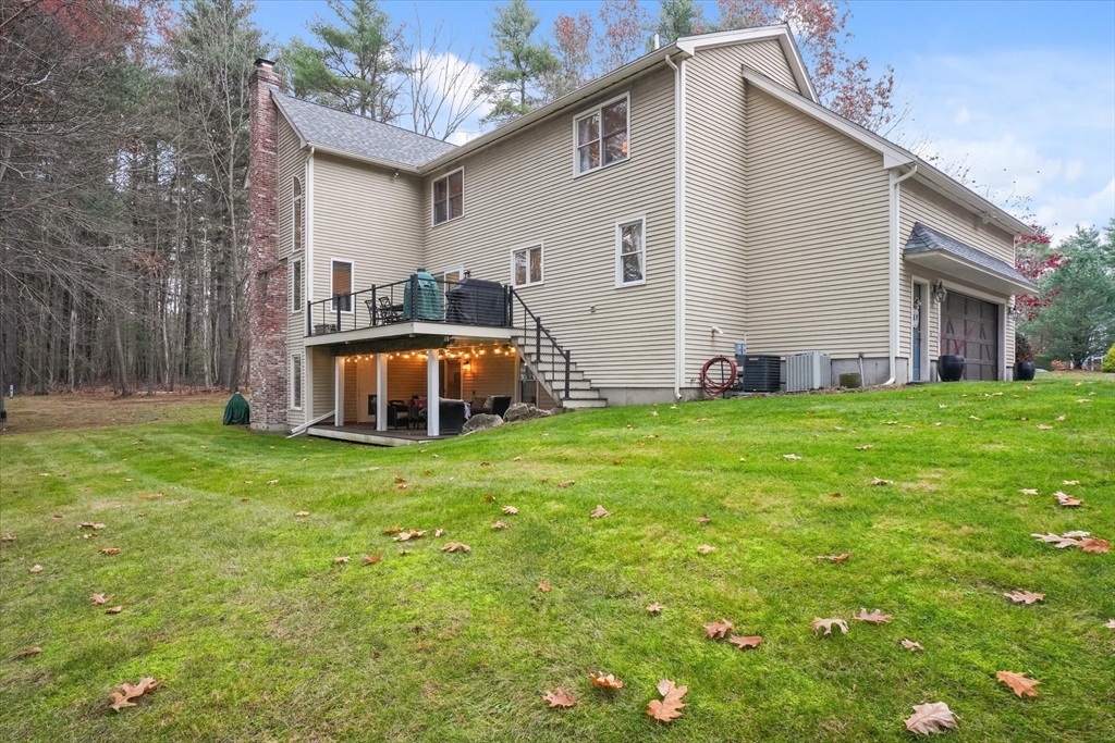 20 Barnside Road Boxford, MA 01921 - Photo 40 of 42 a view of a house with backyard and garden