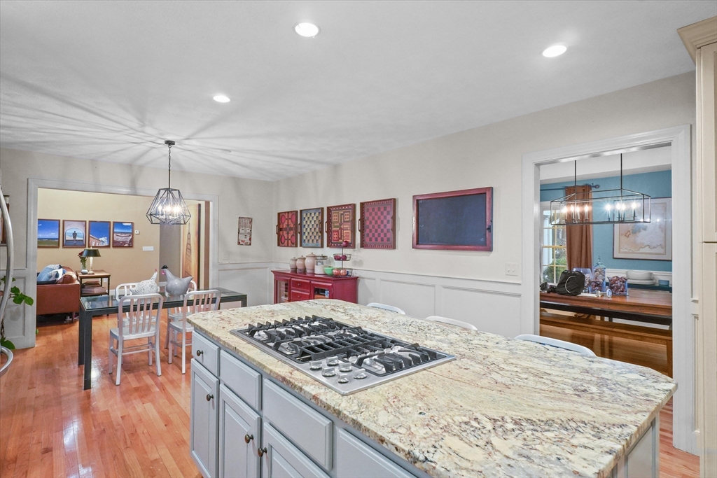 20 Barnside Road Boxford, MA 01921 - Photo 7 of 42 a kitchen with a stove and a wooden floor