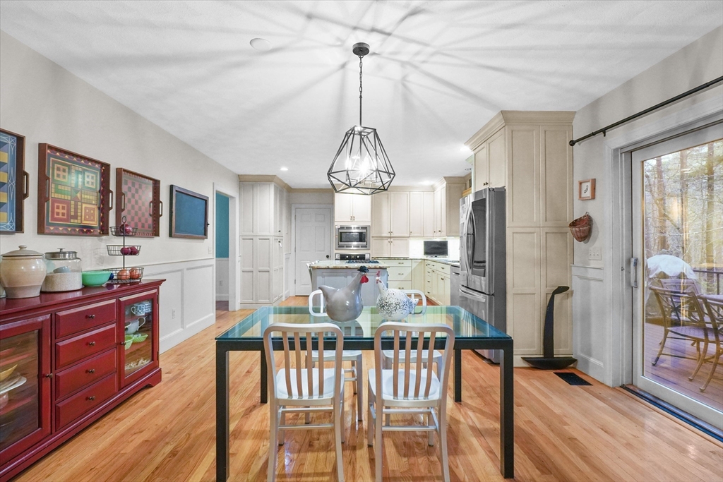 20 Barnside Road Boxford, MA 01921 - Photo 8 of 42 a view of a dining room with furniture window and wooden floor