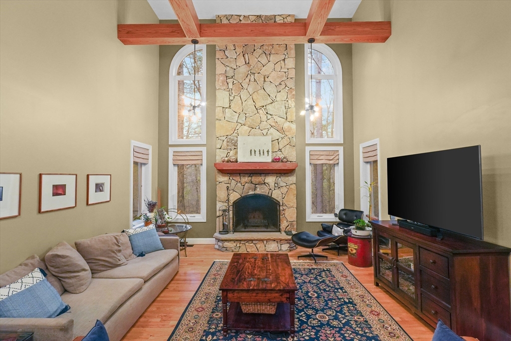 20 Barnside Road Boxford, MA 01921 - Photo 10 of 42 a living room with furniture and a fireplace