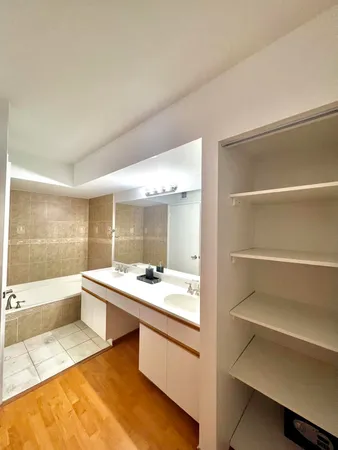 a bathroom with a sink and a bathtub