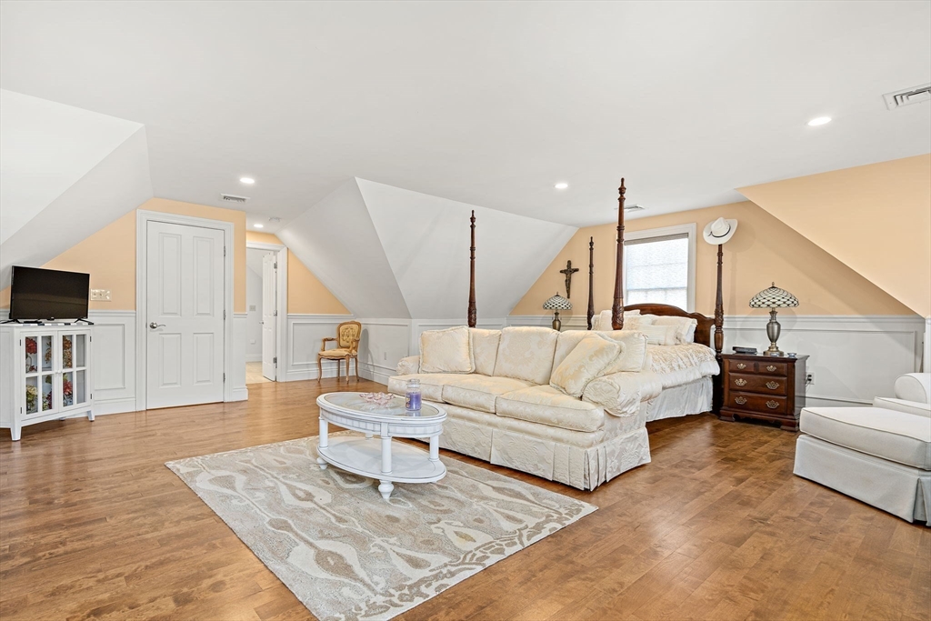53 Linden Road Hampton Falls, NH 03844 - Photo 16 of 42 a living room with furniture and wooden floor