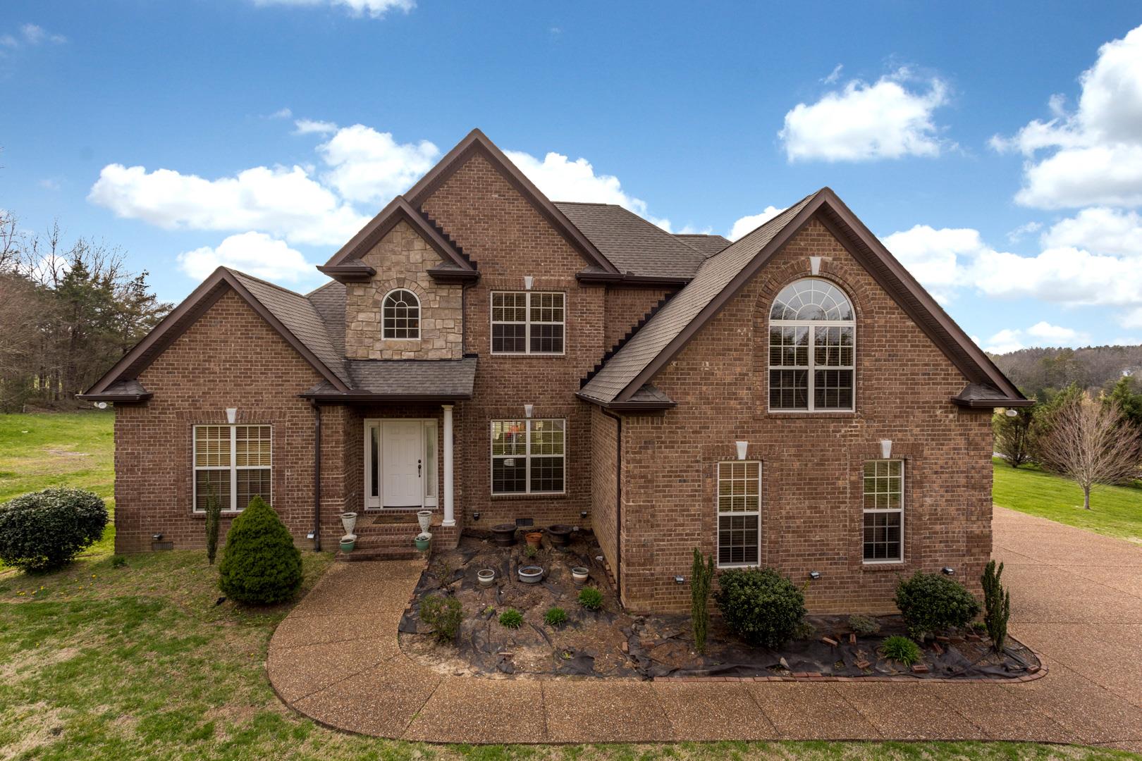 245 Dunaway Road Lebanon, TN 37090 - Photo 1 of 30 a front view of a house with a yard