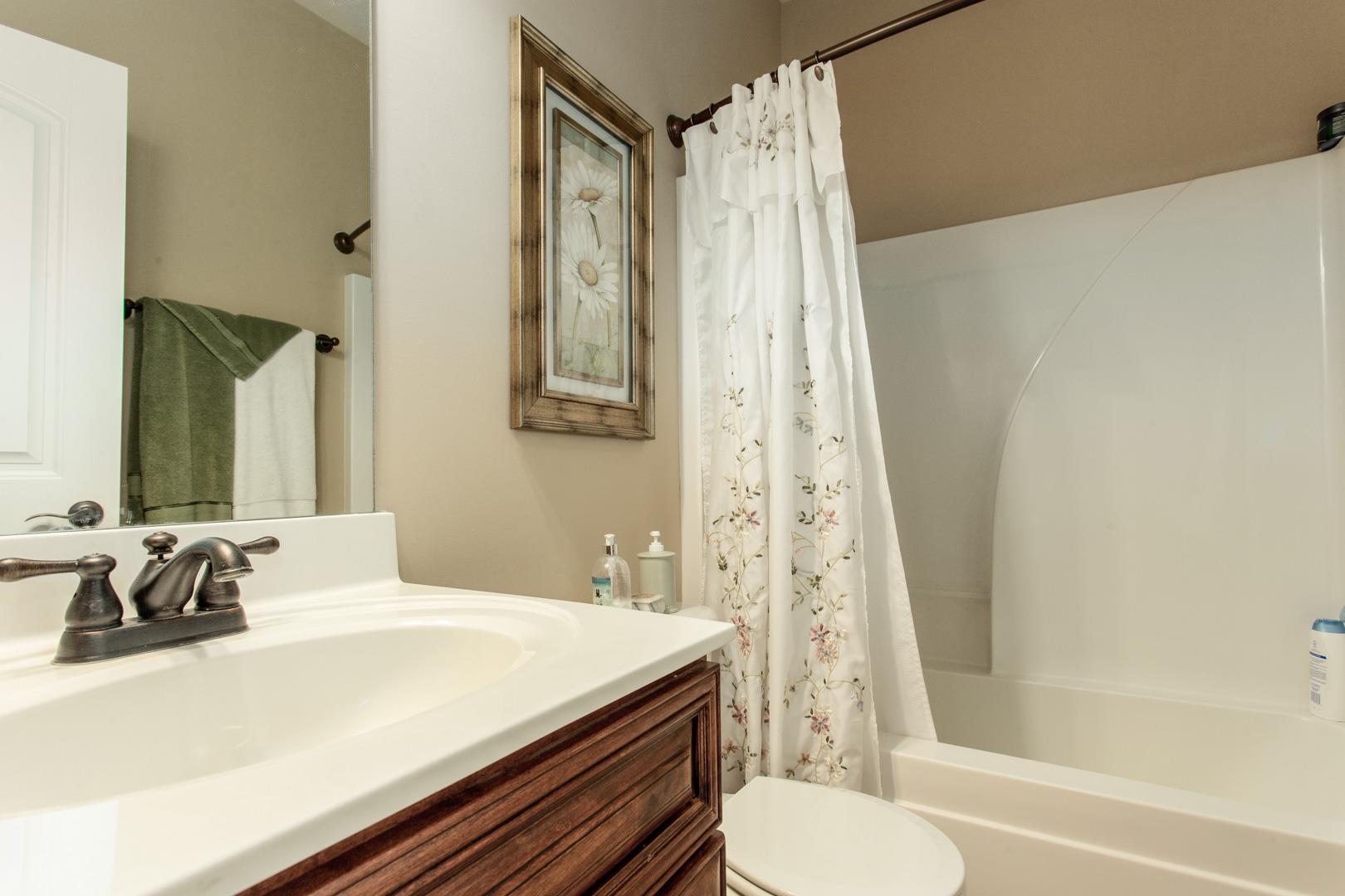 245 Dunaway Road Lebanon, TN 37090 - Photo 21 of 30 a bathroom with a sink toilet and shower