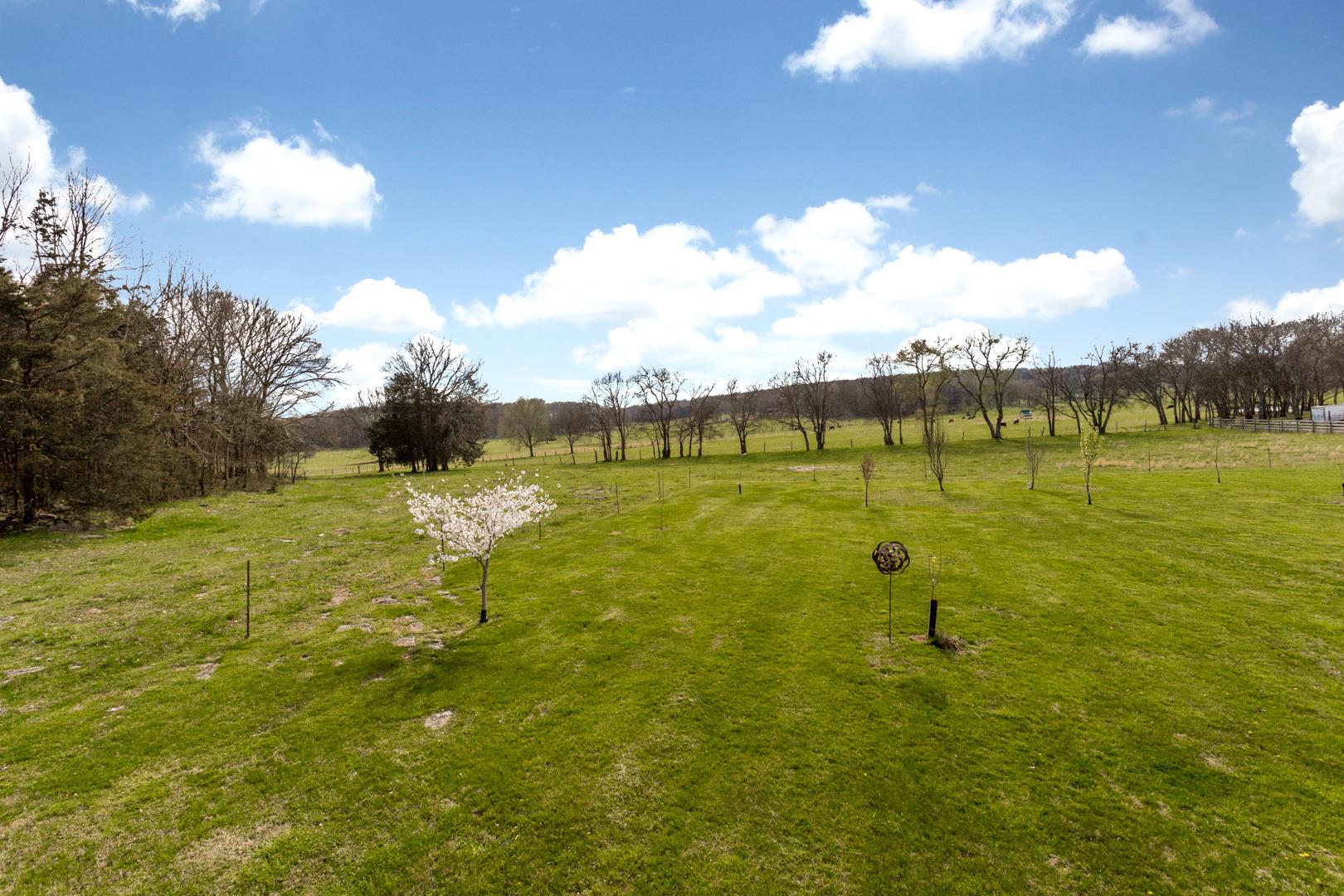 245 Dunaway Road Lebanon, TN 37090 - Photo 25 of 30 a view of a golf course with a lake