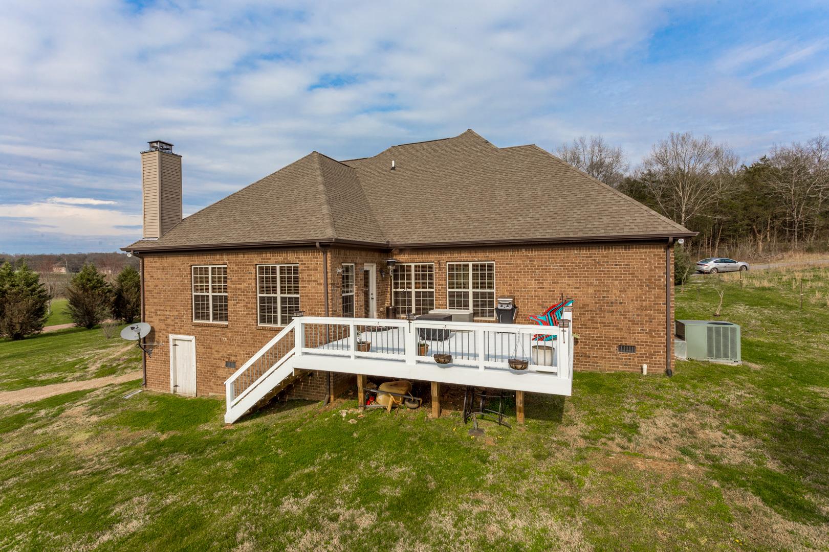245 Dunaway Road Lebanon, TN 37090 - Photo 30 of 30 a front view of a house with a yard table and chairs