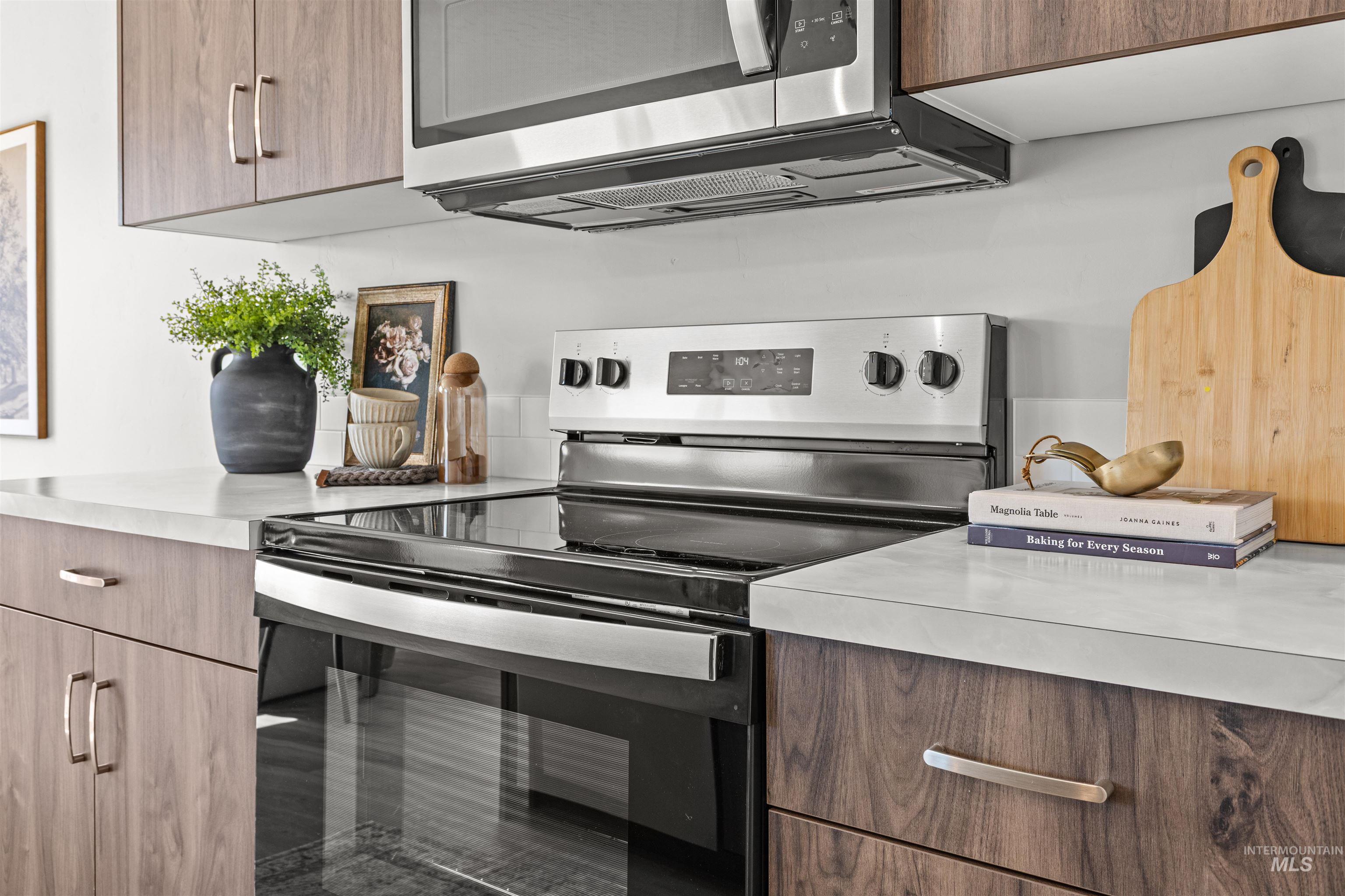 2534 West Fallon Loop Nampa, ID 83651 - Photo 14 of 28 Kitchen featuring stainless steel appliances, light countertops, and modern cabinets