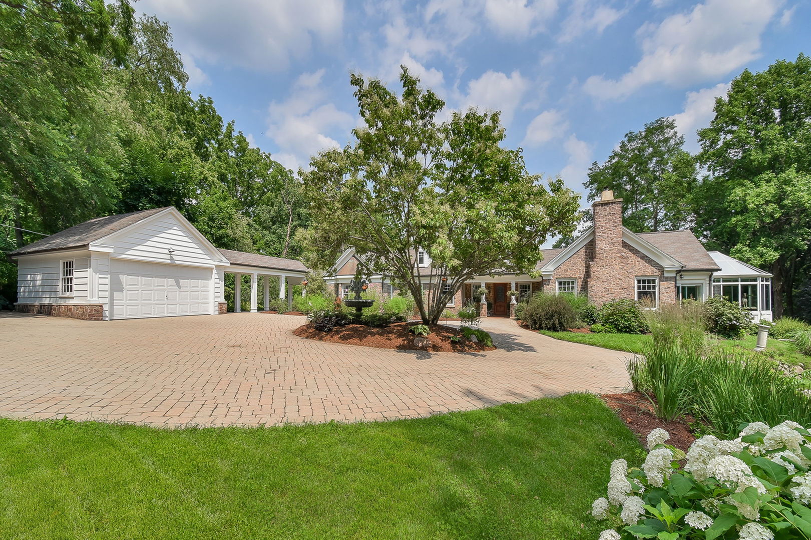 6N197 Denker Road St. Charles, IL 60175 - Photo 15 of 73 a front view of house with yard and trees in the background
