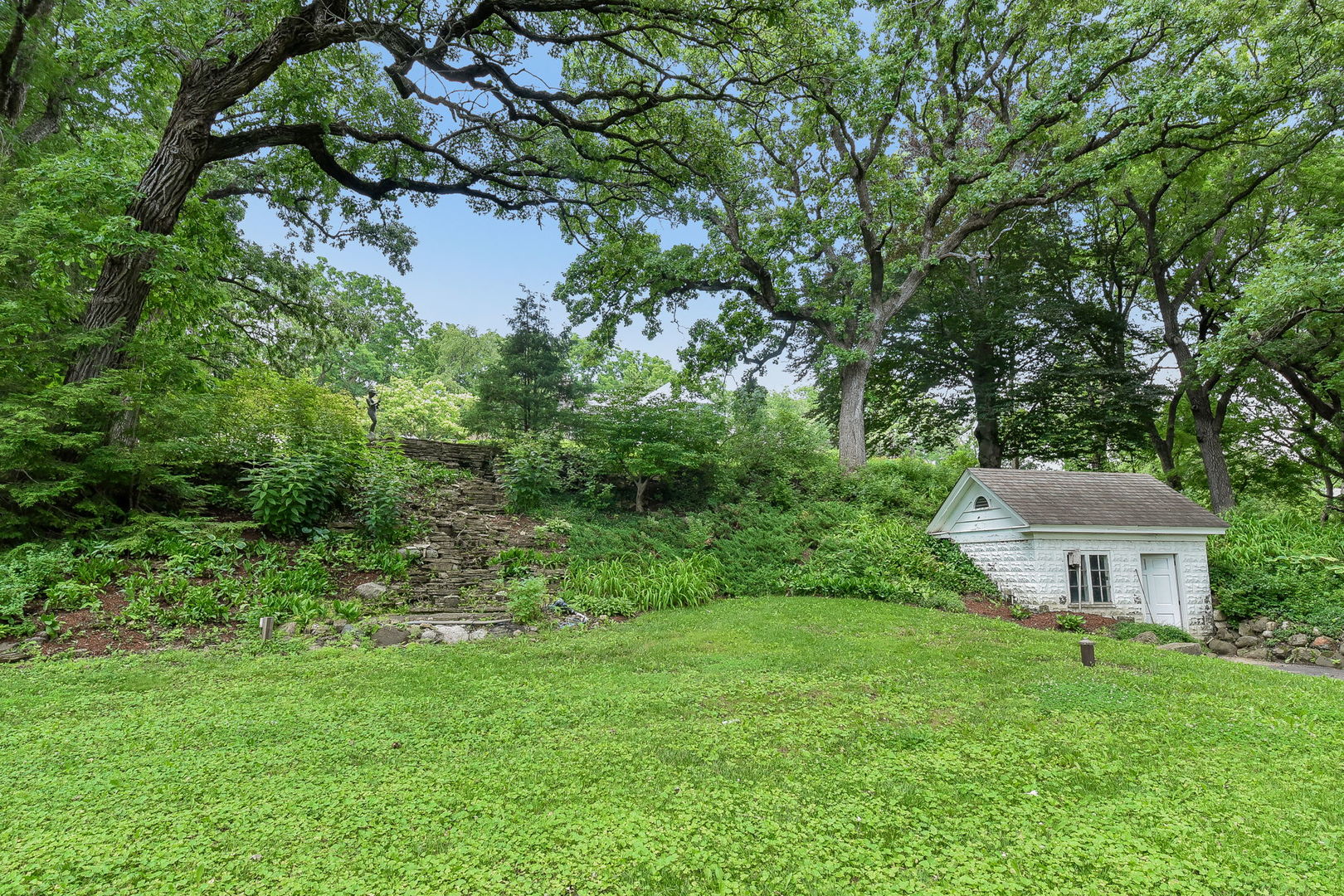 6N197 Denker Road St. Charles, IL 60175 - Photo 23 of 73 a view of a house with a backyard and a garden