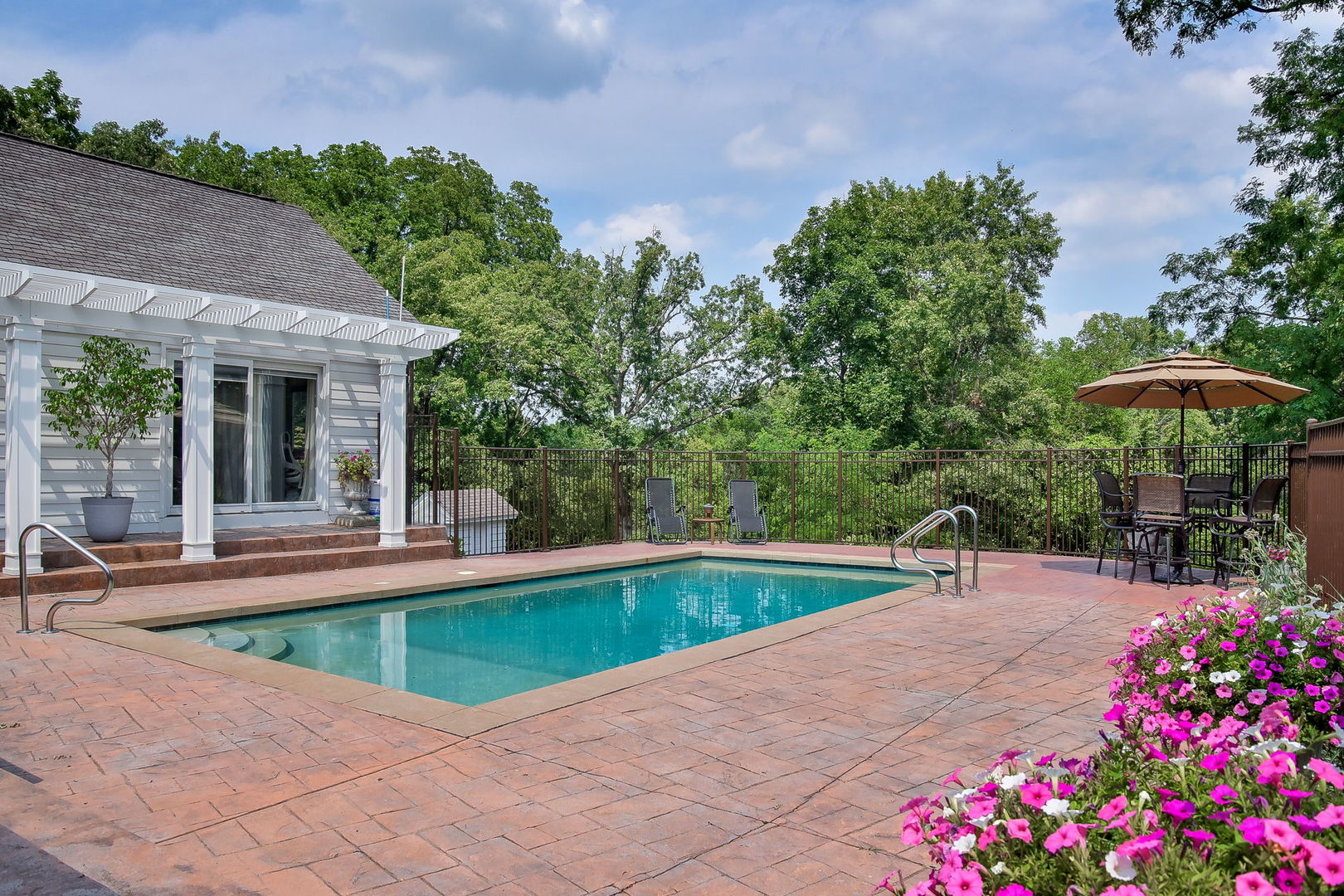 6N197 Denker Road St. Charles, IL 60175 - Photo 48 of 73 a view of a house with swimming pool and sitting area