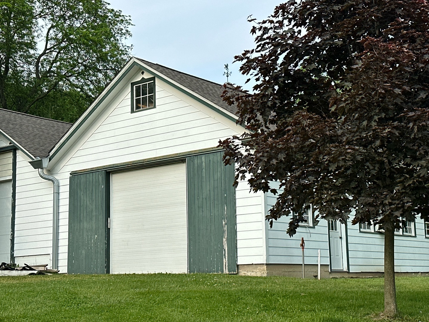 6N197 Denker Road St. Charles, IL 60175 - Photo 50 of 73 a front view of a house with a garden