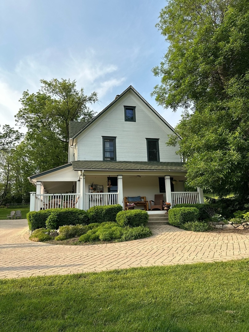 6N197 Denker Road St. Charles, IL 60175 - Photo 52 of 73 a front view of a house with a yard