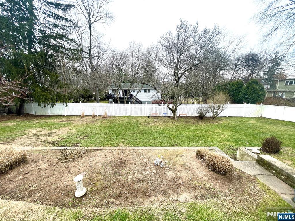 47-49 Fairview Avenue, Unit A Closter, NJ 07624 - Photo 17 of 19 a view of a yard with large trees