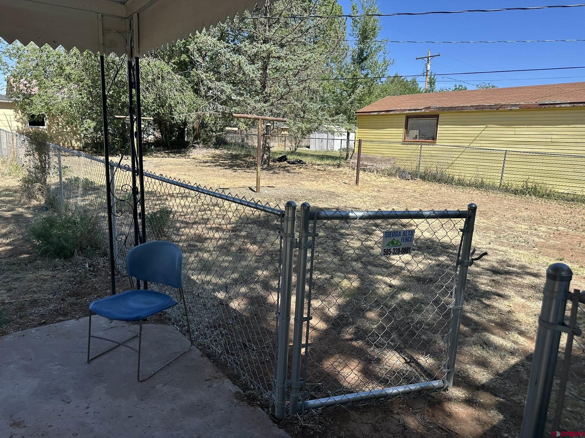 435 South Elm Street Cortez, CO 81321 - Photo 16 of 17 a view of a bench in the patio