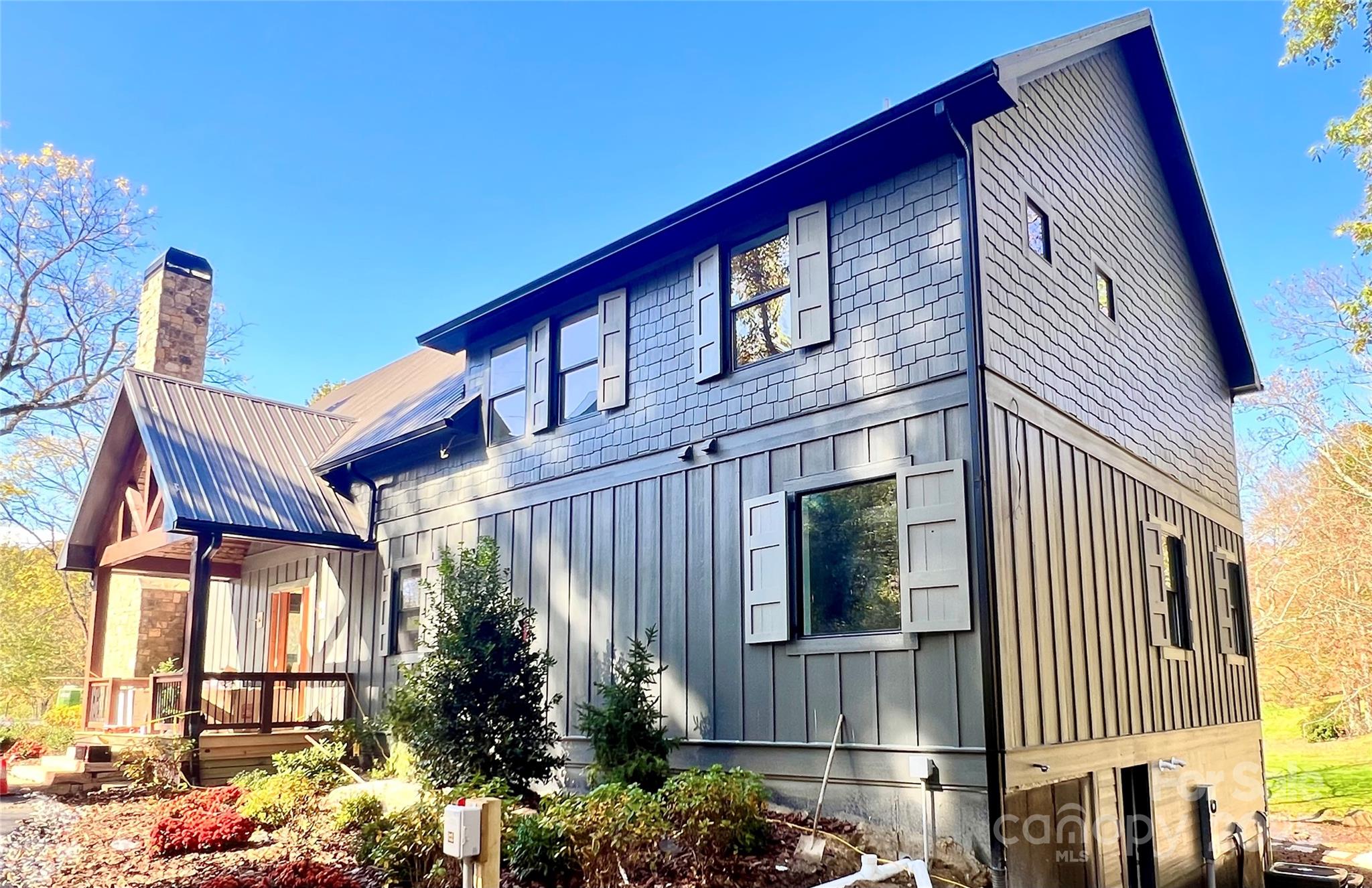 159 Comanche Road Cullowhee, NC 28723 - Photo 11 of 34 a front view of a house with a yard