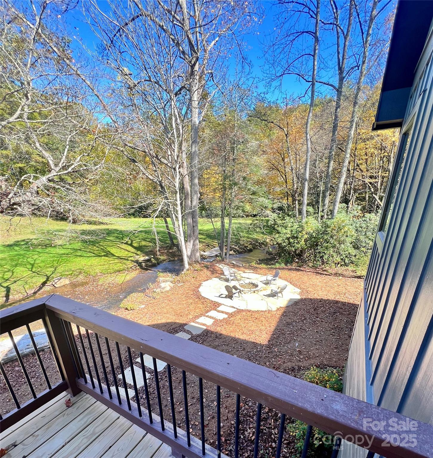 159 Comanche Road Cullowhee, NC 28723 - Photo 14 of 34 a view of a backyard with sitting area