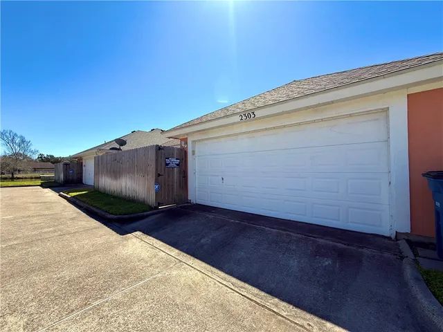 a front view of house with a yard
