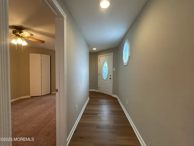a kitchen with a stove top oven sink and cabinets