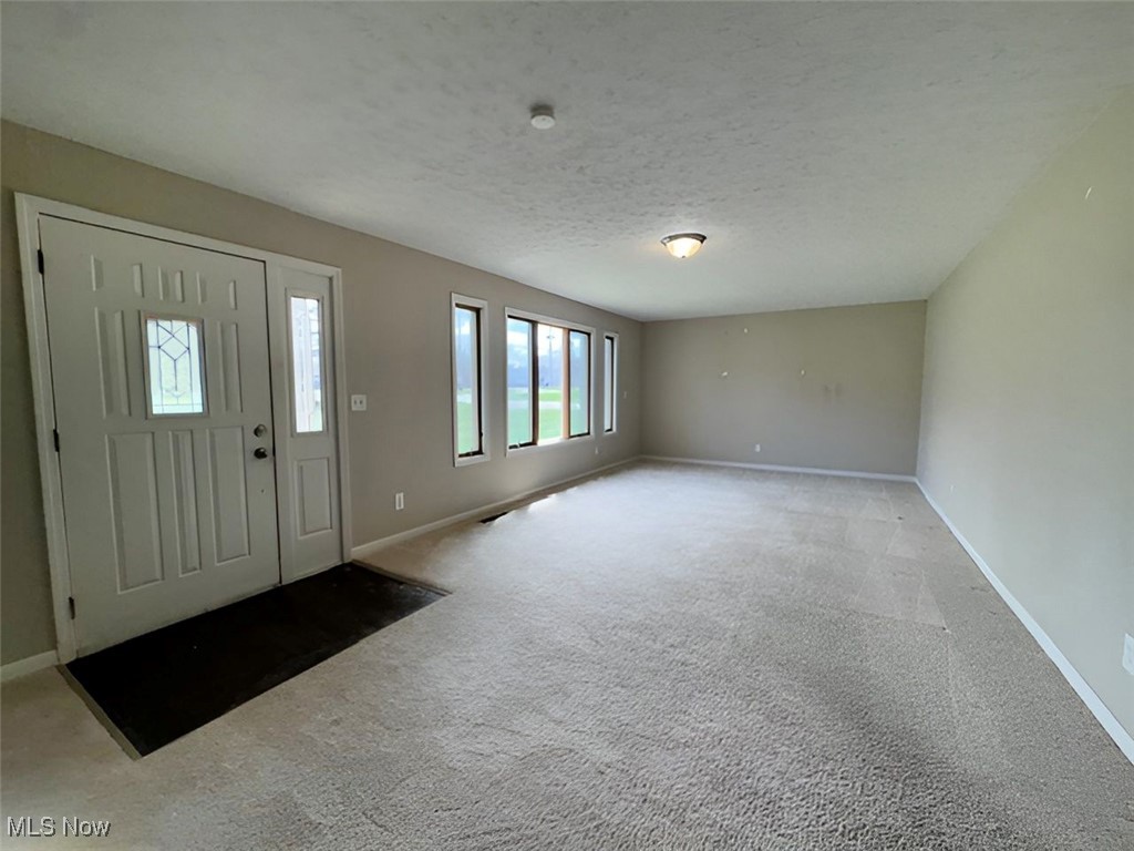 6224 Reynolds Road Mentor, OH 44060 - Photo 14 of 29 Foyer featuring carpet floors and baseboards
