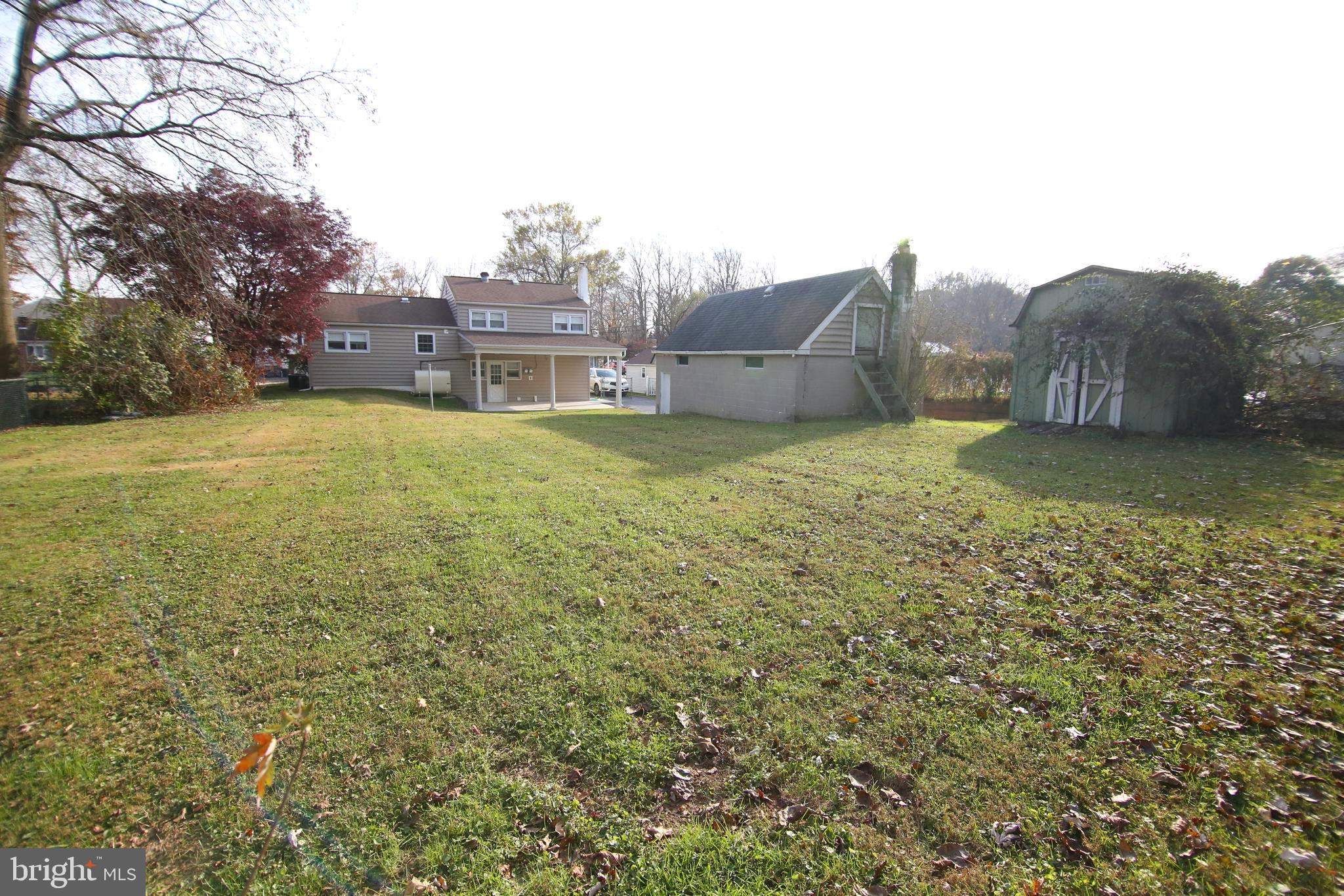 230 Rumpf Avenue Langhorne, PA 19047 - Photo 22 of 23 Rear Yard with Detached Garage and Storage Shed