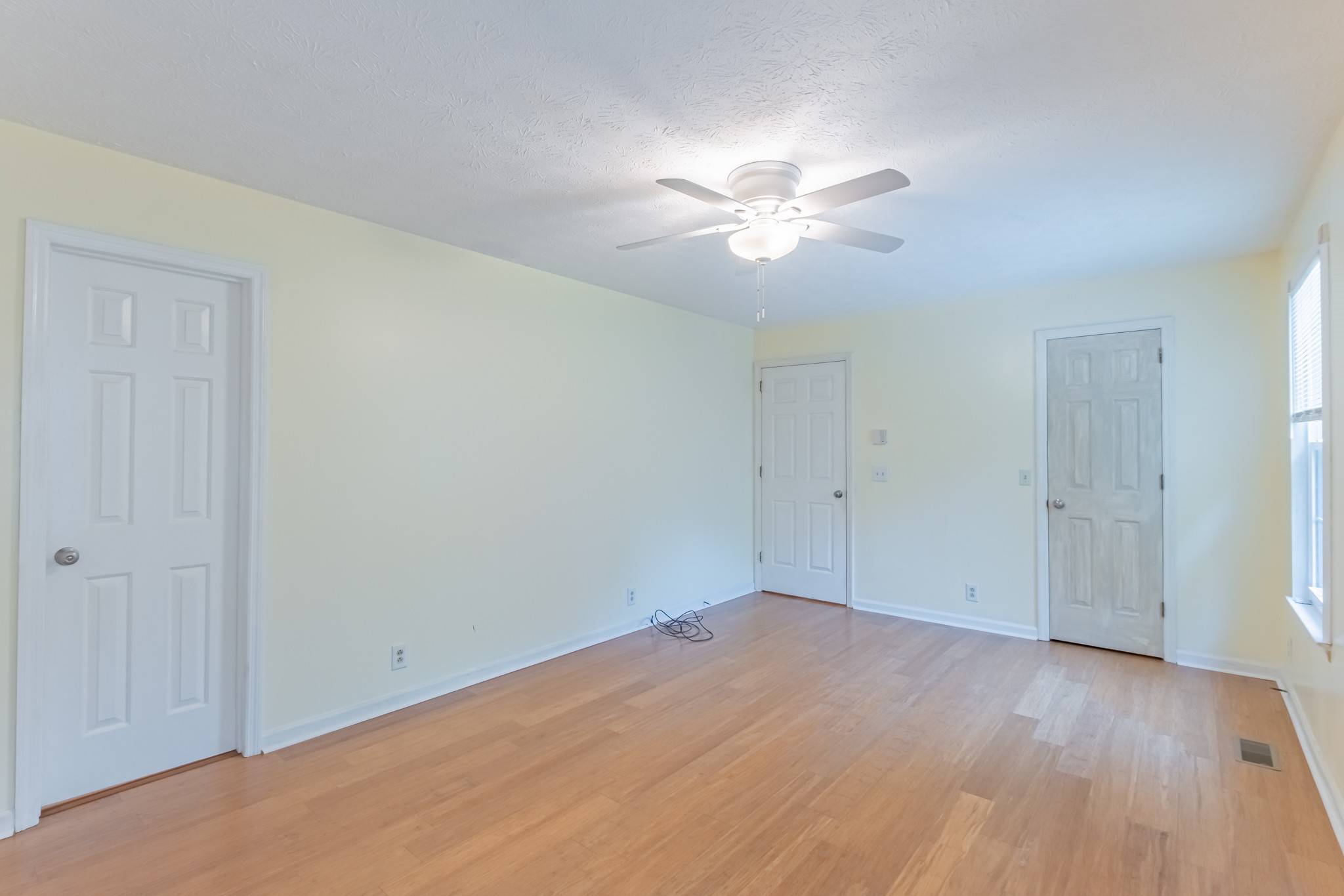 181 Bonnafield Drive Hermitage, TN 37076 - Photo 12 of 44 a view of empty room with wooden floor