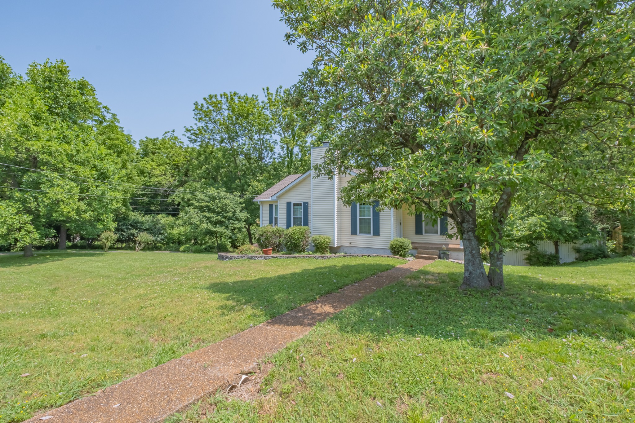 181 Bonnafield Drive Hermitage, TN 37076 - Photo 3 of 44 a house view with a garden space