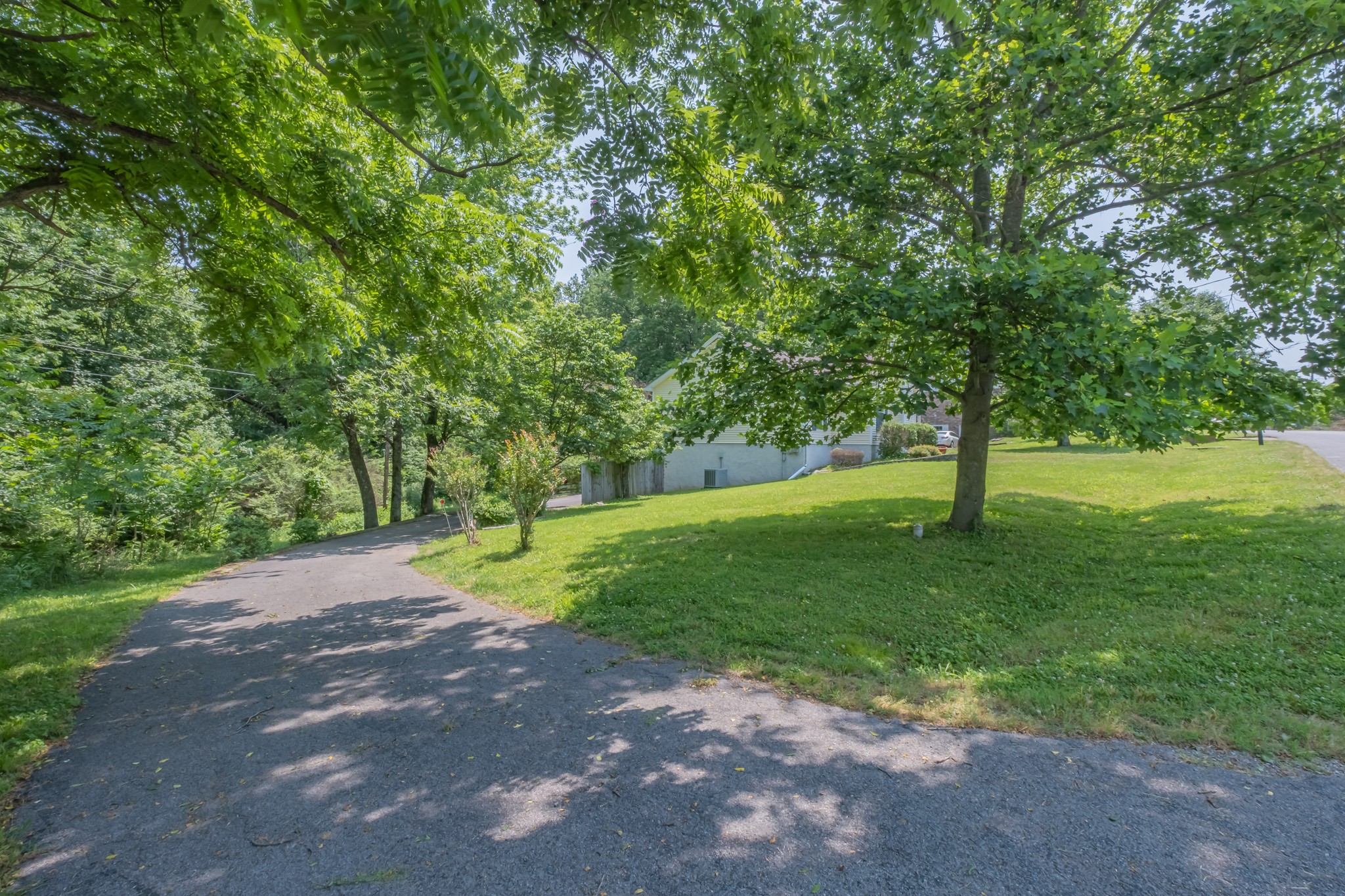 181 Bonnafield Drive Hermitage, TN 37076 - Photo 43 of 44 a view of green field with trees in the background
