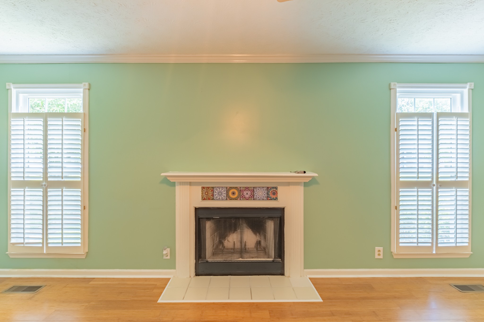 181 Bonnafield Drive Hermitage, TN 37076 - Photo 7 of 44 a living room with a fireplace and a wooden floor