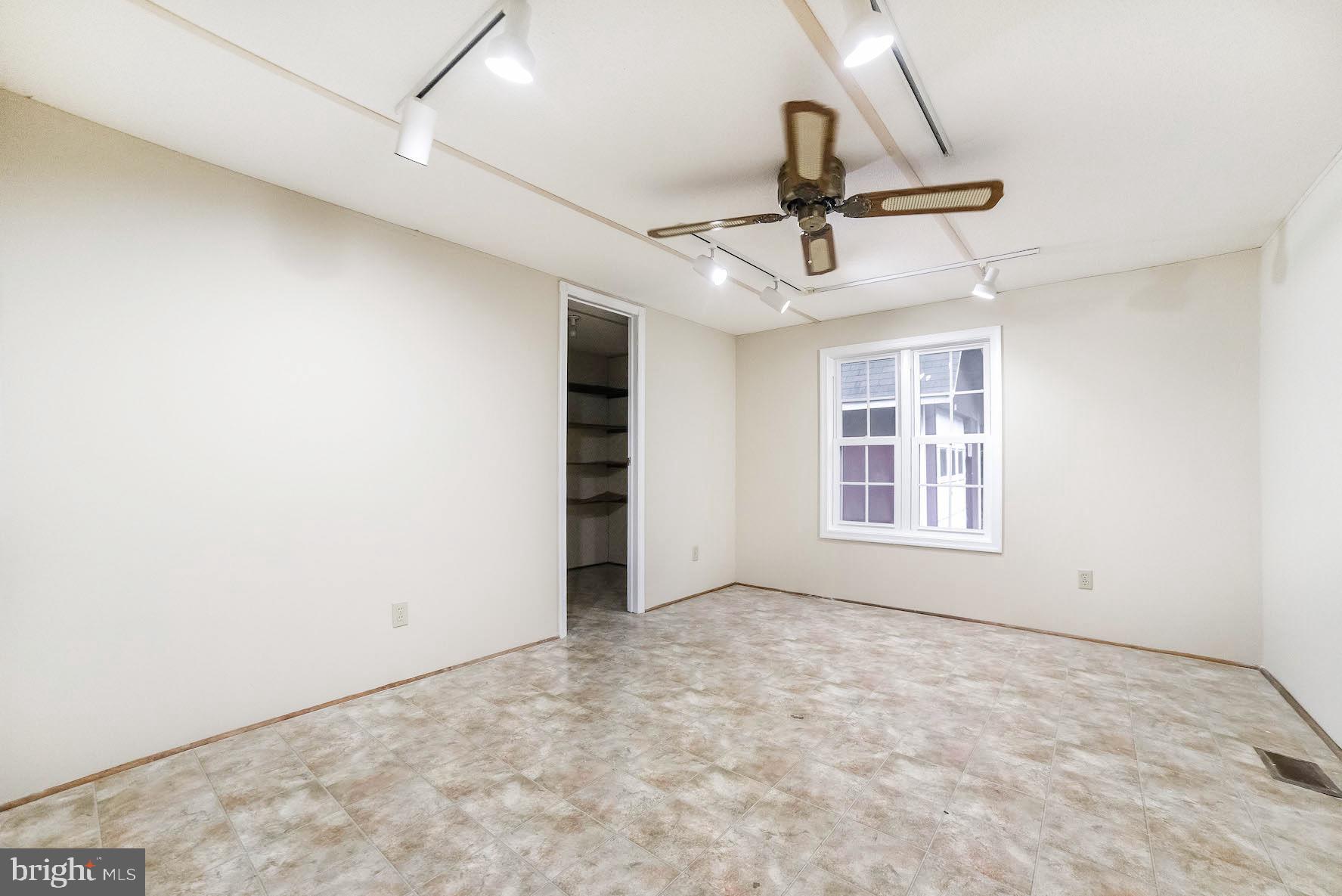 23293 By The Mill Road California, MD 20619 - Photo 16 of 28 Second bedroom with ceiling fan