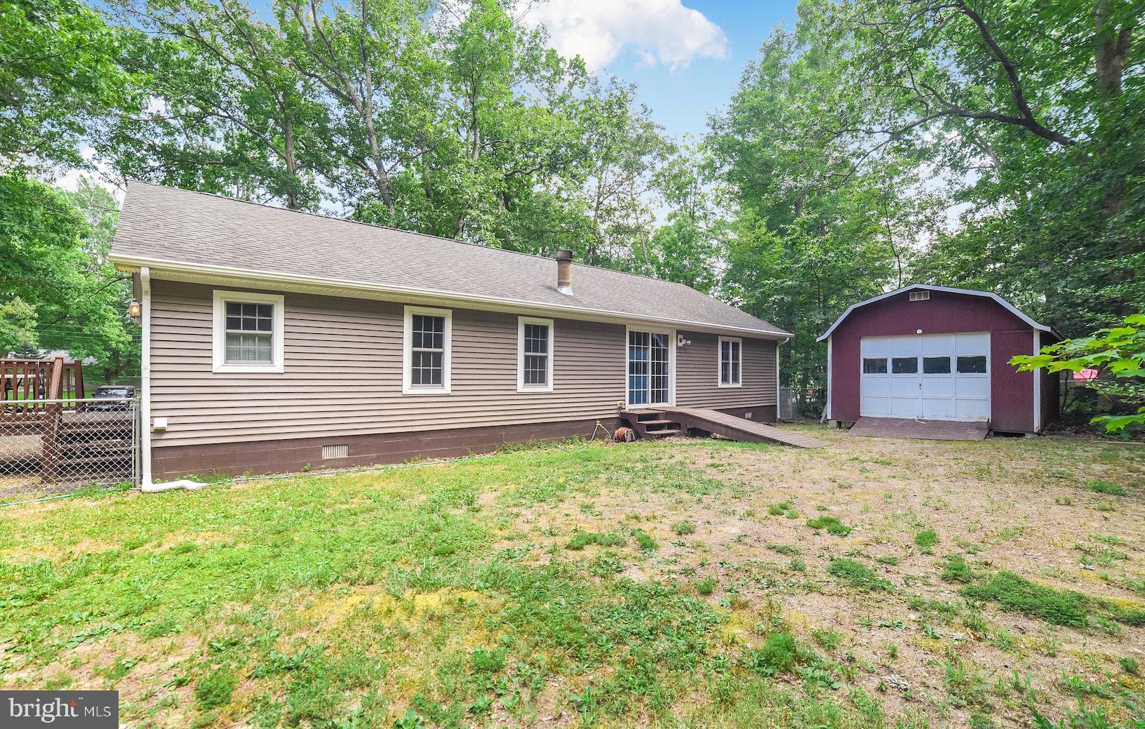 23293 By The Mill Road California, MD 20619 - Photo 27 of 28 Back yard is fenced with 20 x 14 shed