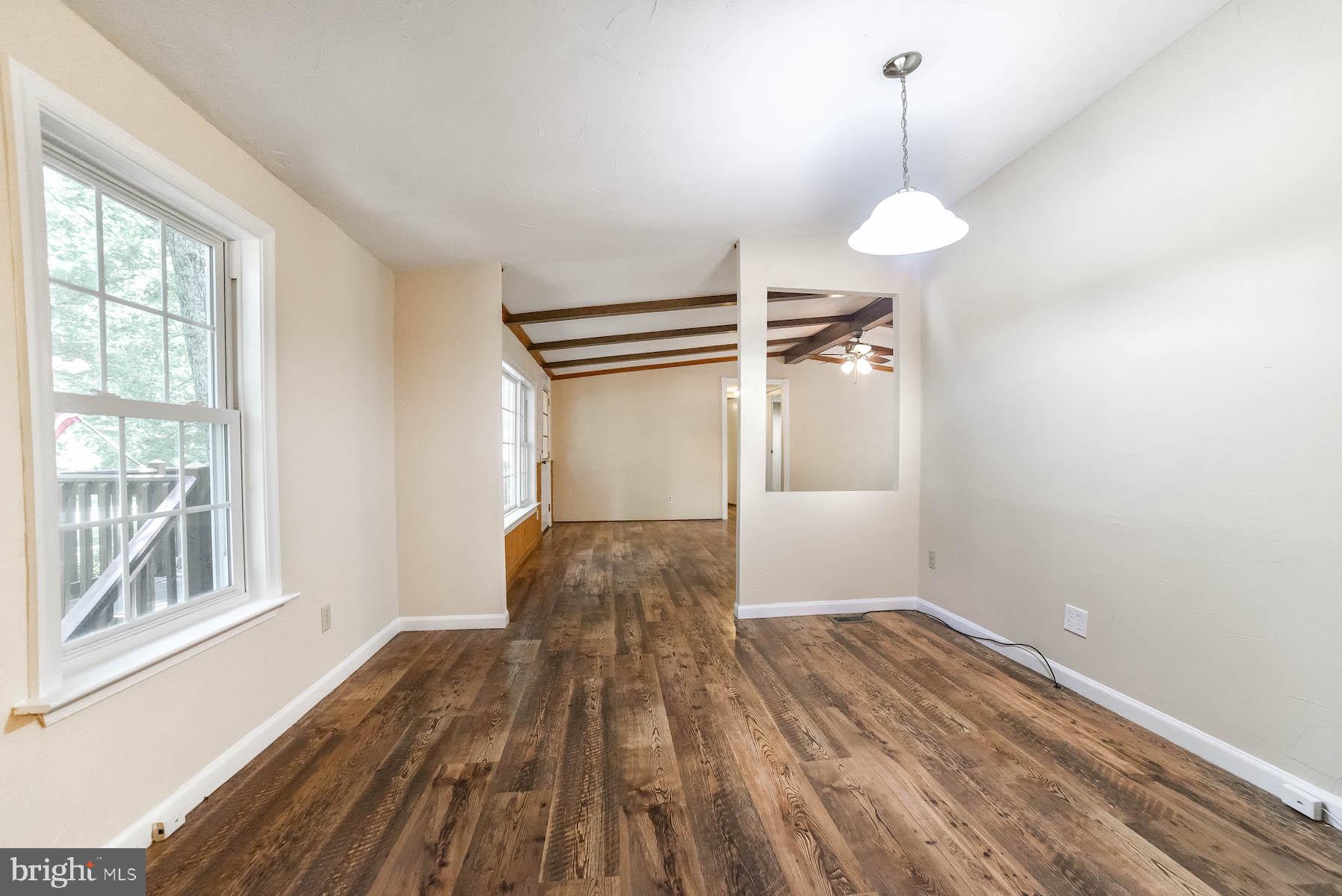 23293 By The Mill Road California, MD 20619 - Photo 7 of 28 Dining room has Pergo flooring too