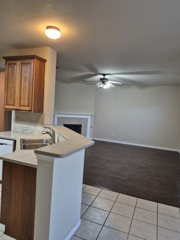 808 Busleigh Castle Way Pflugerville, TX 78660 - Photo 11 of 30 a kitchen with a sink and cabinets