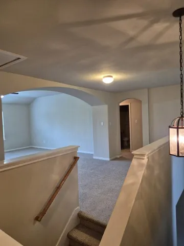 a view of kitchen and hallway