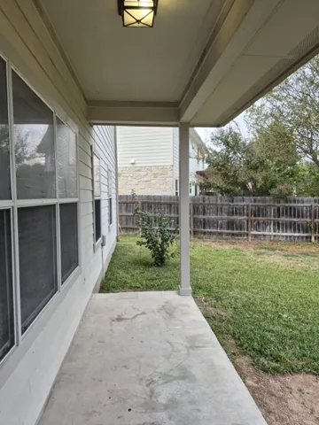 a view of a backyard with garden