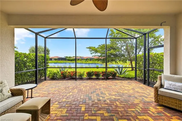 a view of porch with a bench in patio