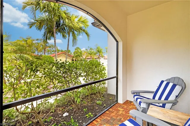 a view of balcony with wooden floor