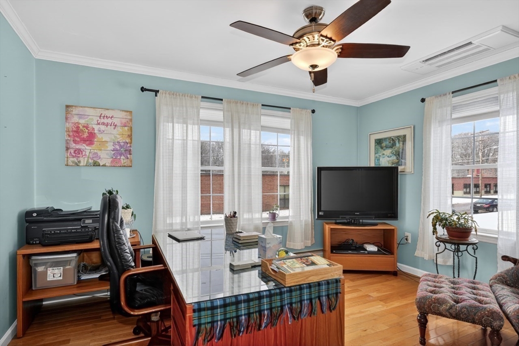 37 Tower Street Hudson, MA 01749 - Photo 15 of 35 a living room with furniture and a flat screen tv