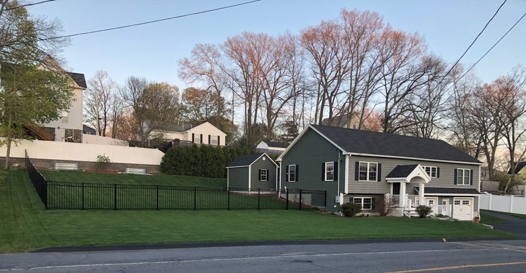 37 Tower Street Hudson, MA 01749 - Photo 3 of 35 a view of a yard in front of house