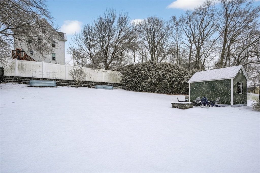 37 Tower Street Hudson, MA 01749 - Photo 32 of 35 a view of a house with a snow in the yard