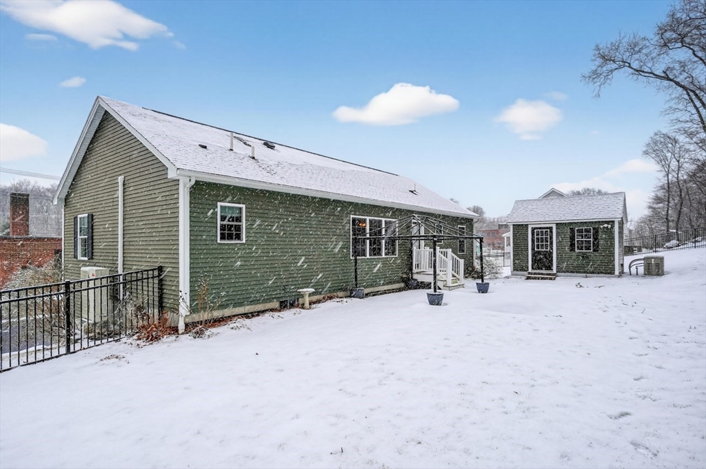 37 Tower Street Hudson, MA 01749 - Photo 33 of 35 a view of a house with a patio