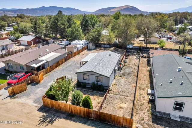 a view of city from balcony with seating space