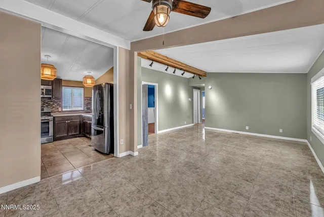 a view of a hallway with windows