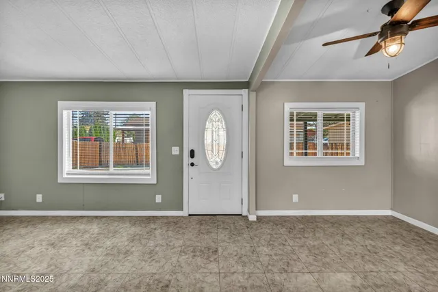 a view of empty room with windows