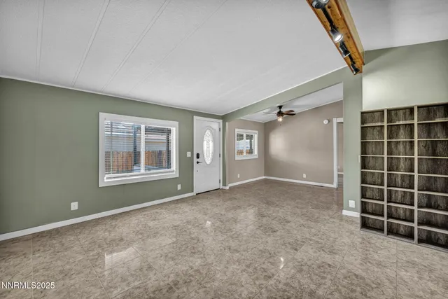 an empty room with windows