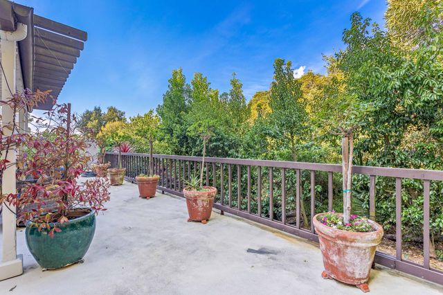 a balcony with outdoor seating