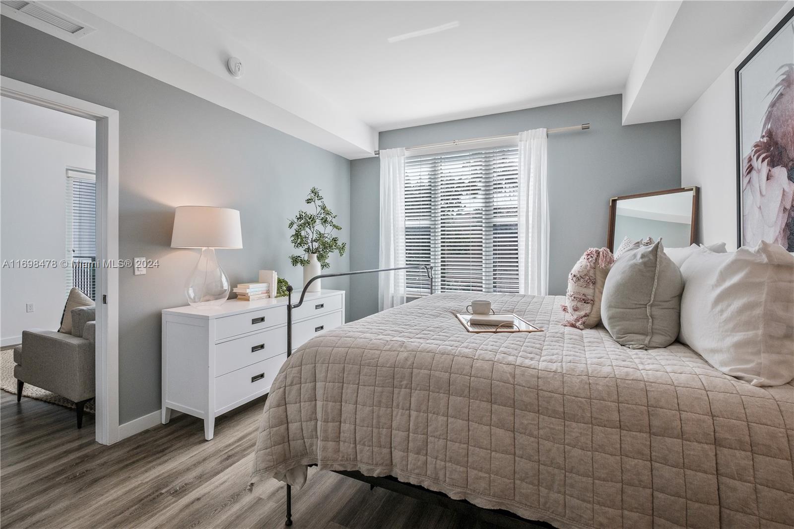 1919 Southeast 10th Avenue, Unit 5104 Fort Lauderdale, FL 33316 - Photo 33 of 35 a bedroom with bed and window