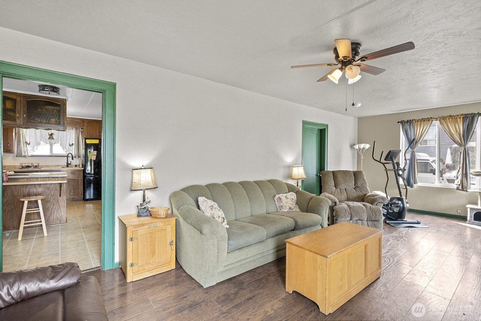 325 3rd Street Morton, WA 98356 - Photo 11 of 40 a living room with furniture and a large window