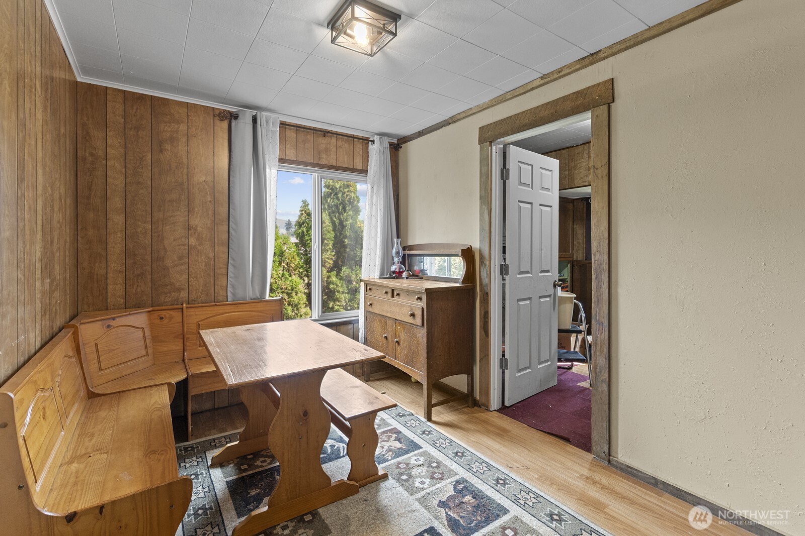 325 3rd Street Morton, WA 98356 - Photo 12 of 40 a workspace with furniture and window