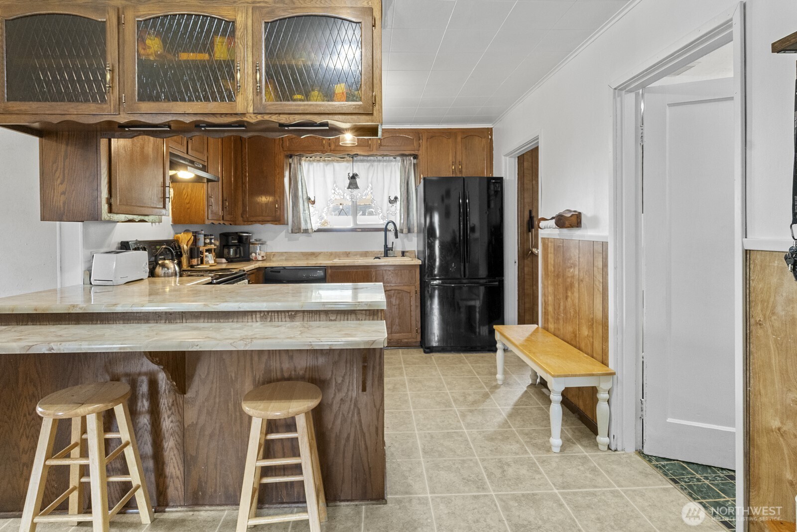 325 3rd Street Morton, WA 98356 - Photo 17 of 40 a kitchen with a sink cabinets and appliances