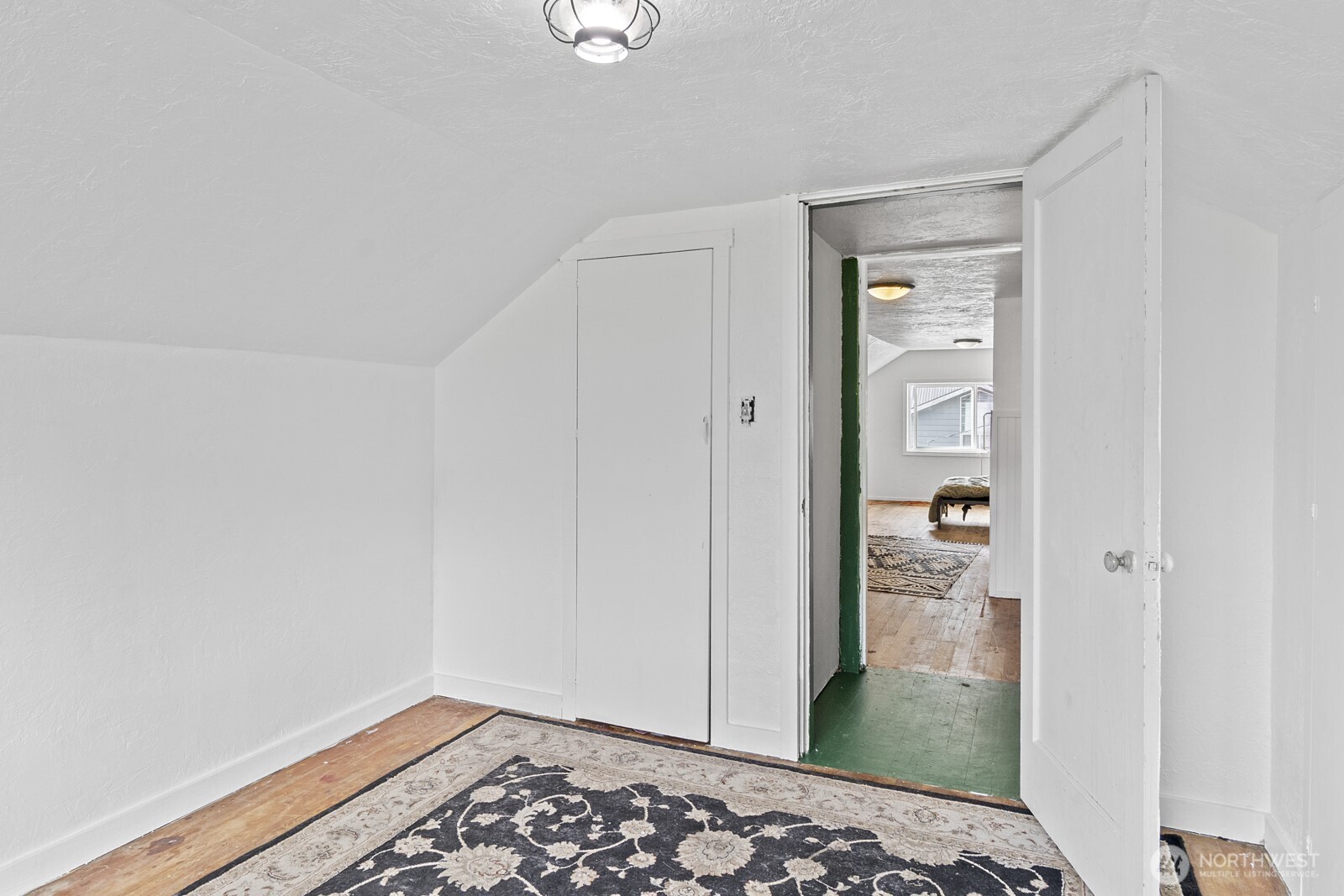 325 3rd Street Morton, WA 98356 - Photo 21 of 40 a view of a room that has a bench in it